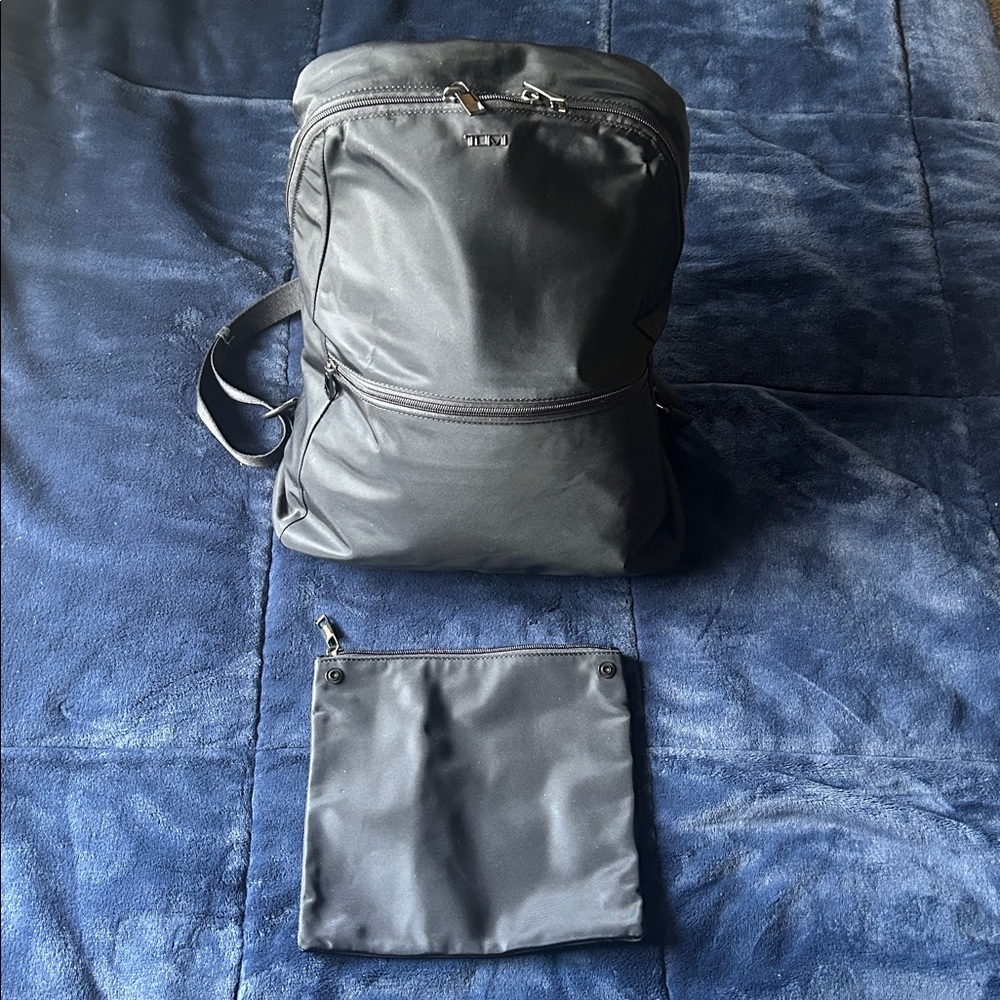 Tumi Black Backpack w/ Tracer Plate + Matching Pouch. Excellent condition.